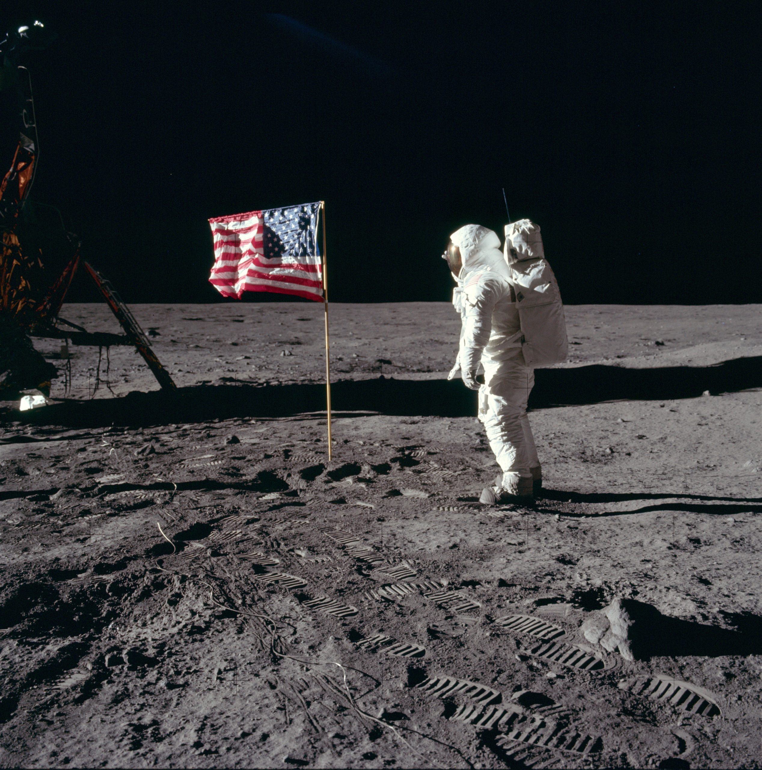 Buzz Aldrin salutes the deployed United States flag on the lunar surface